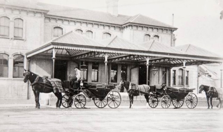 Horse drawn cabs outside Hove station in 1896