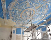 Decorative plaster ceiling undergoing restoration