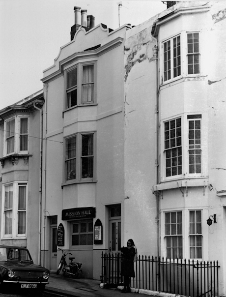 monochrome photo of a terraced house
