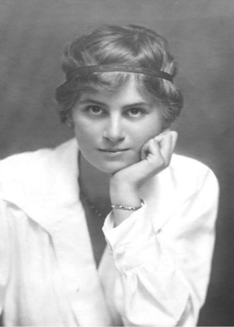 A monochrome photo of an elegant young woman