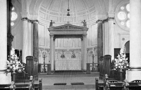 An old monochrome photo from the inside of the church