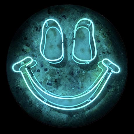 Neon smiley face in electric blue on black